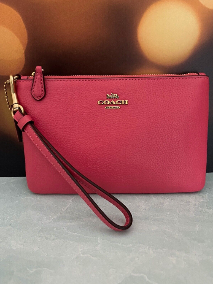 COACH Small Leather Wristlet in Pink